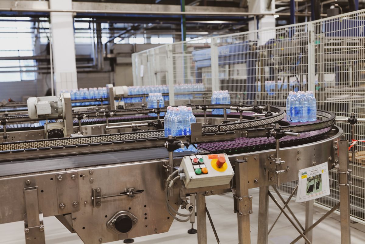 A beverage packaging line running at rate